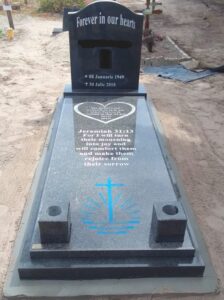 granite tombstone with white lettering